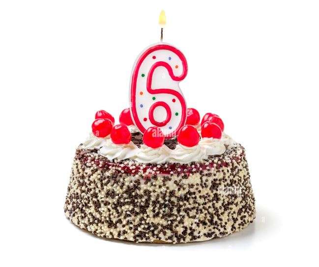tarta con vela seis años